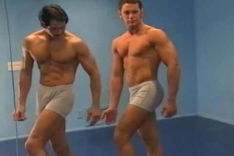 coach training his chap Flexing And Posing