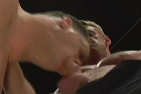 Two Muscle guys In Leather Boots