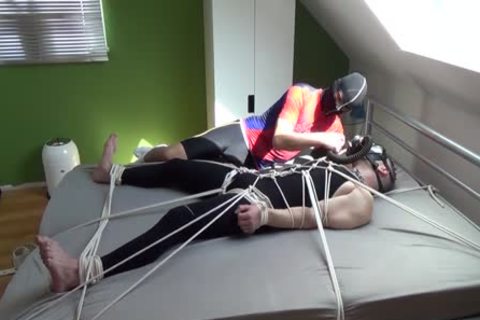 Two boyz Having fun In Lycra With Breathcontrol And Magic Wand