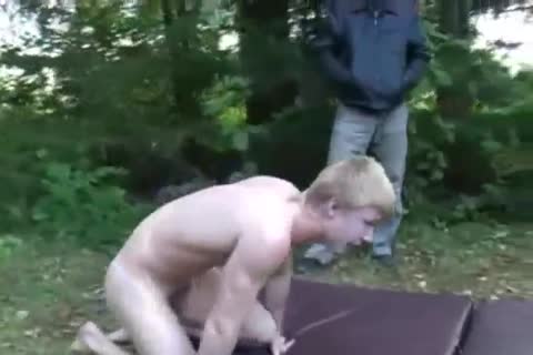 Two boys wrestle